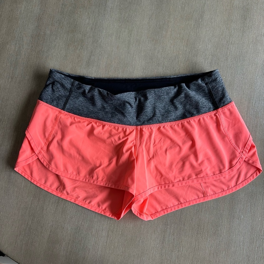 Women's lululemon neon orange Athletic Shorts with Charcoal Waistband 10